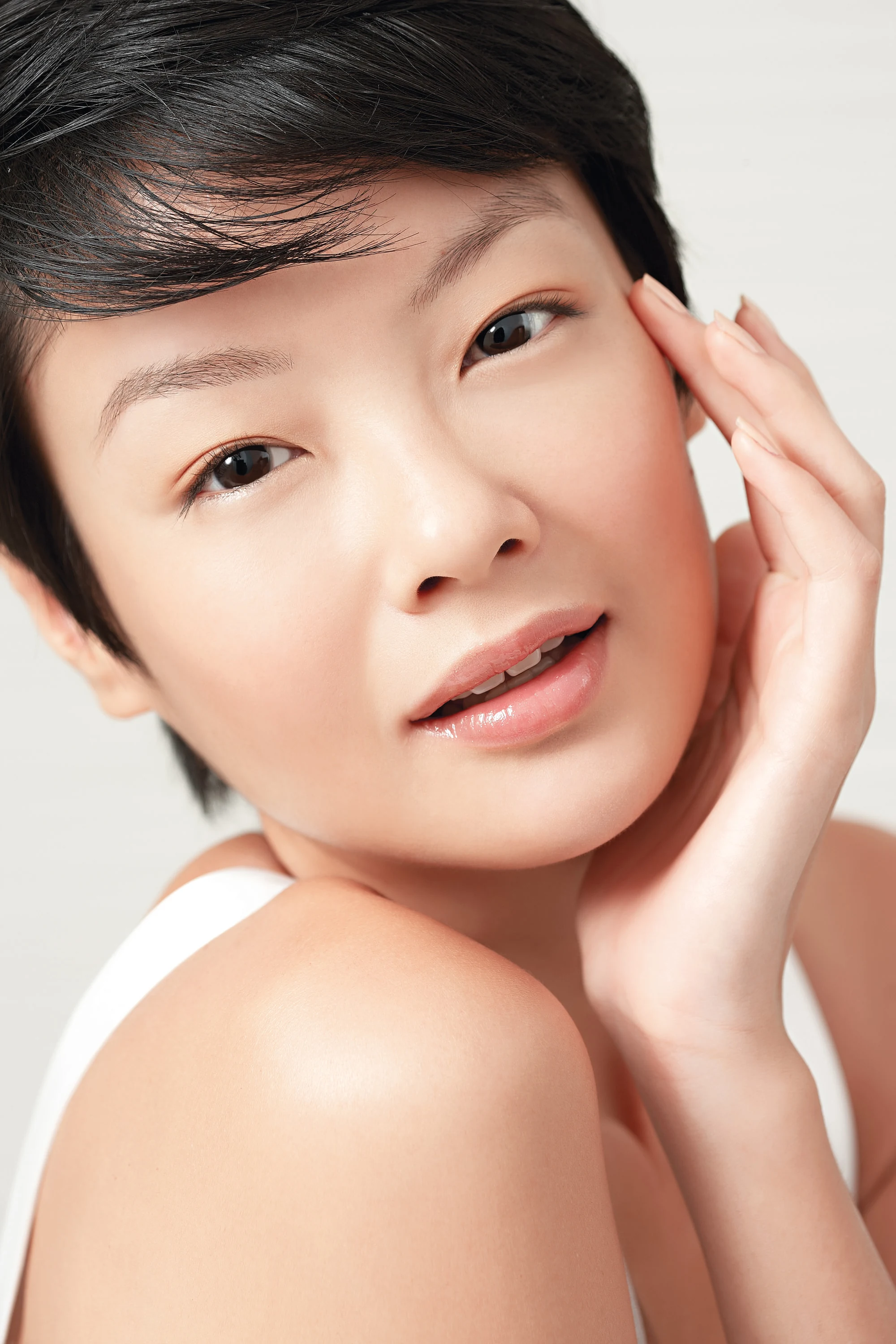 Studio beauty portrait with soft natural makeup